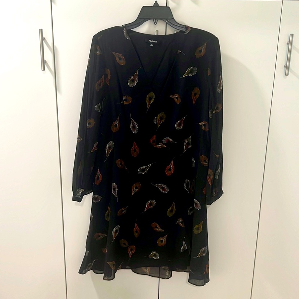 Like new! This versatile dress has only been worn once!